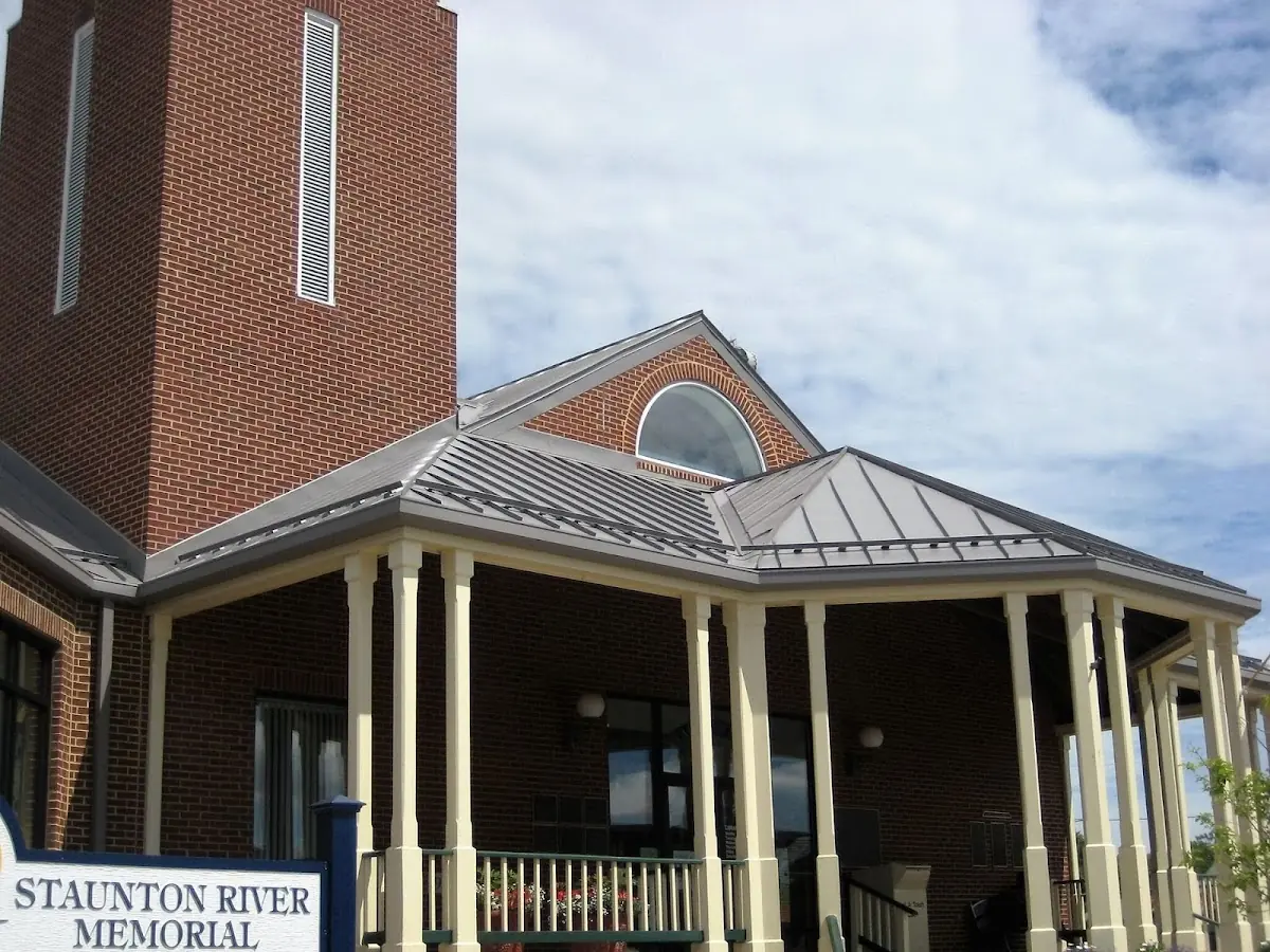 Skilled roofing craftsmen working on a residential roof in Vernon Square